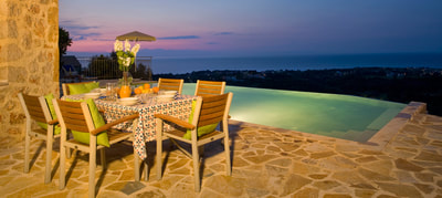 Alfresco dinner by villa pool